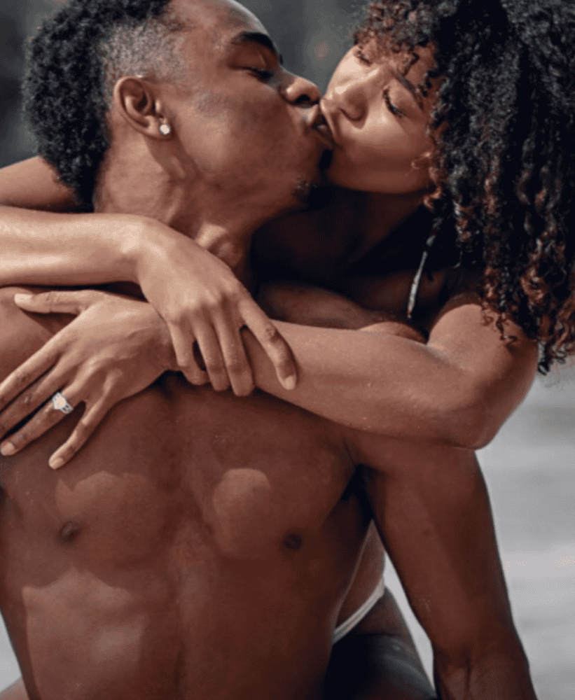 Loving couple embracing at the beach