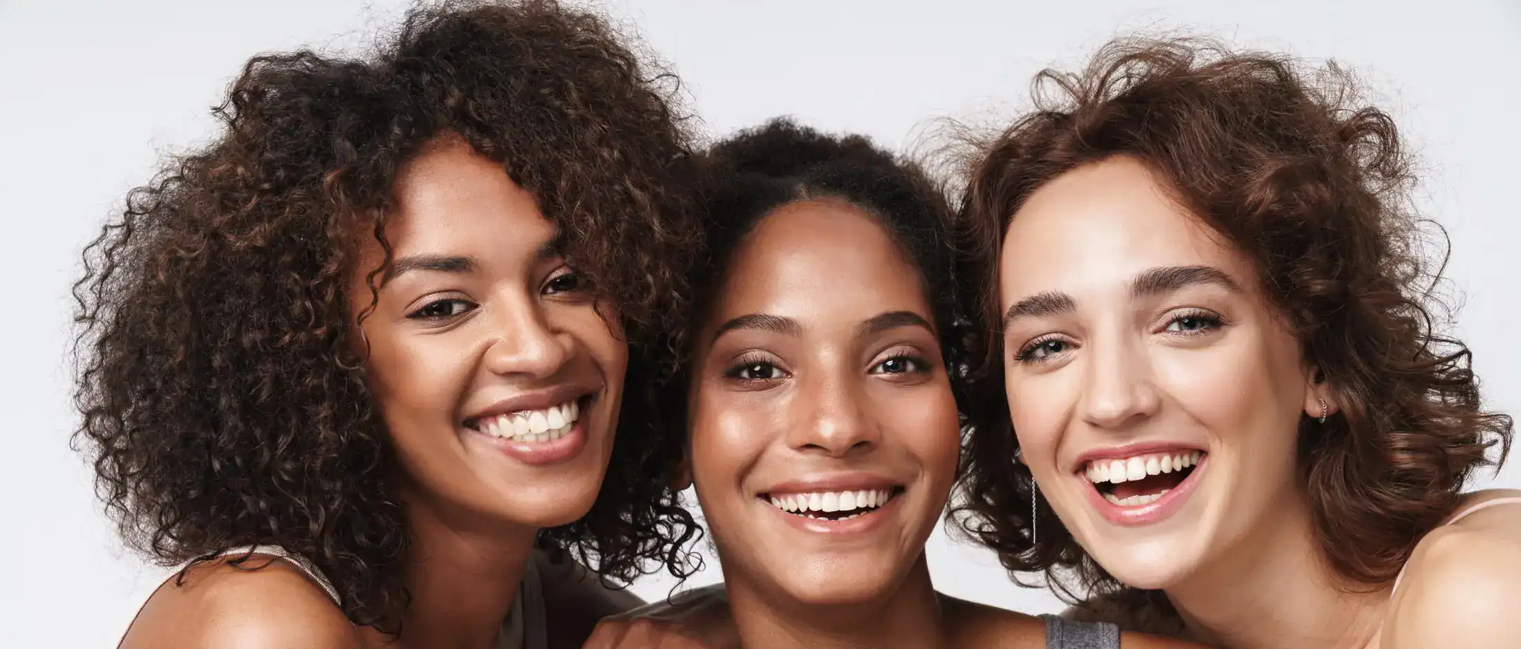 AviClear laser acne treatment promotional image with woman showing clearer skin.