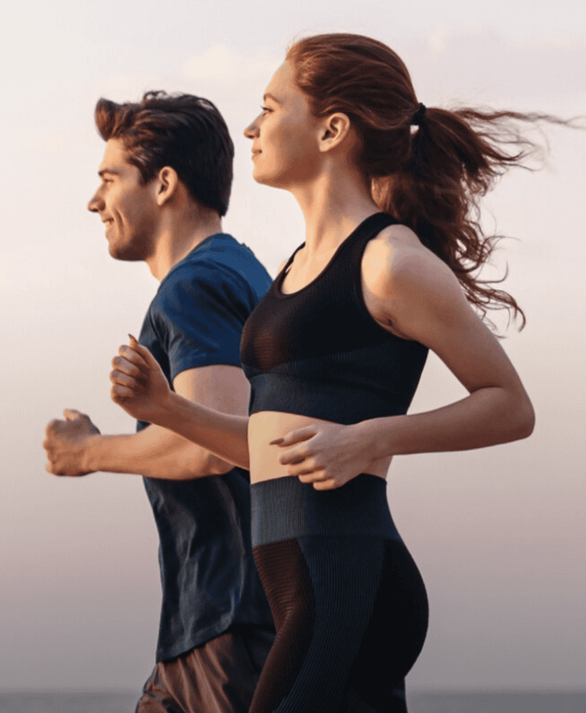 Man and woman jogging together