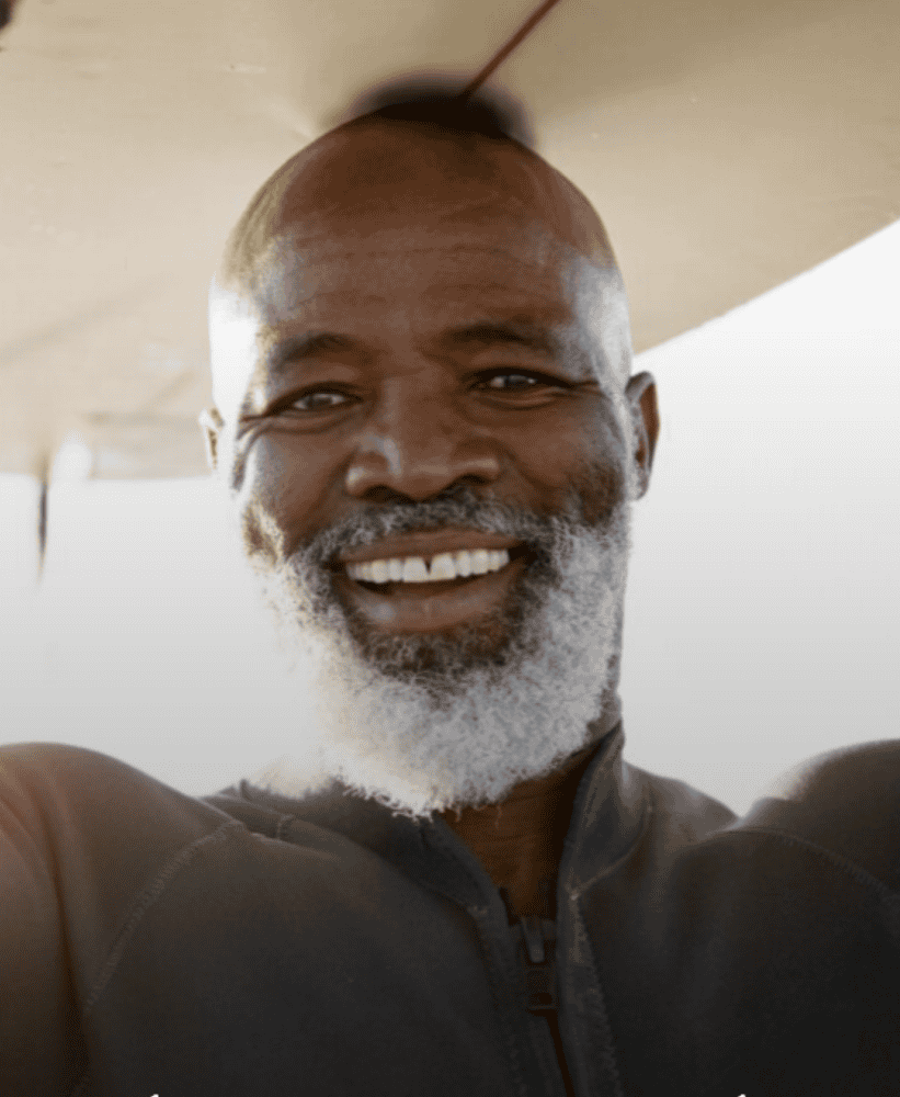 Older man smiling confidently