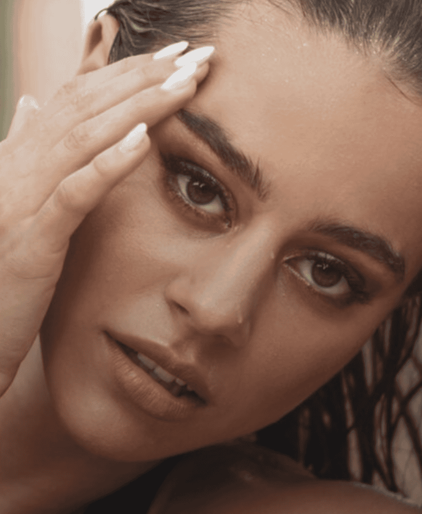 Woman touching face skincare