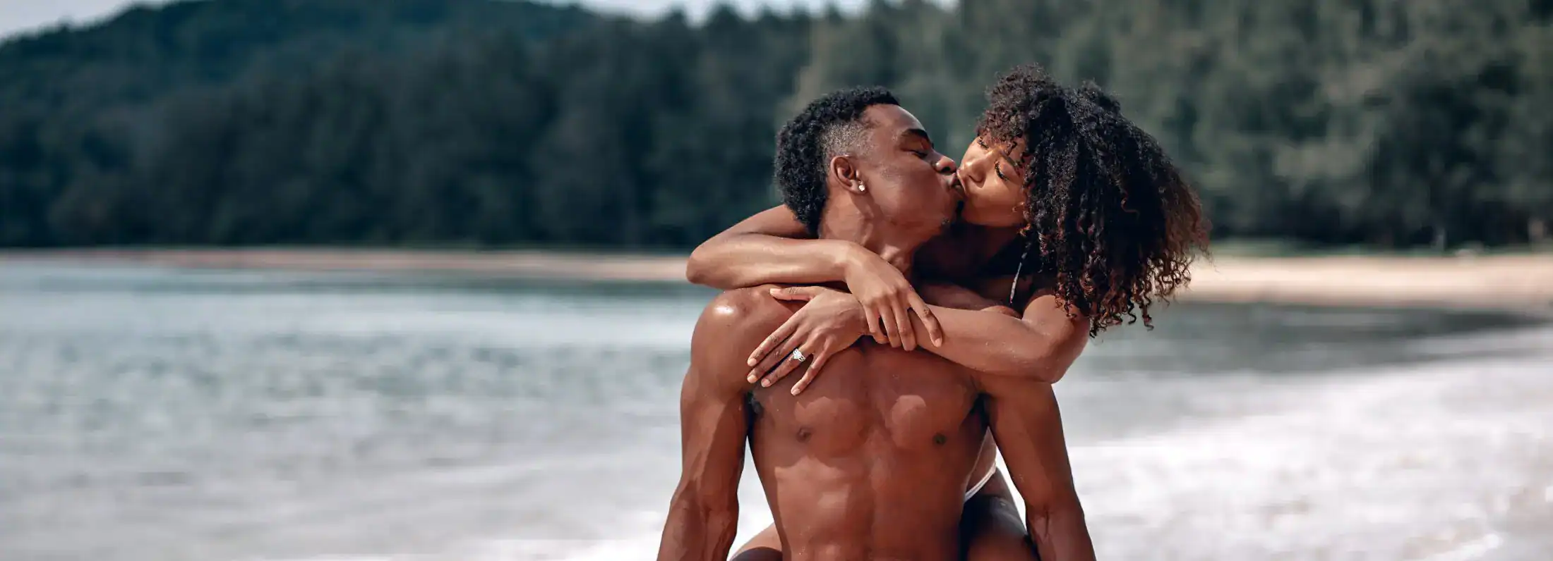 Loving couple embracing at the beach